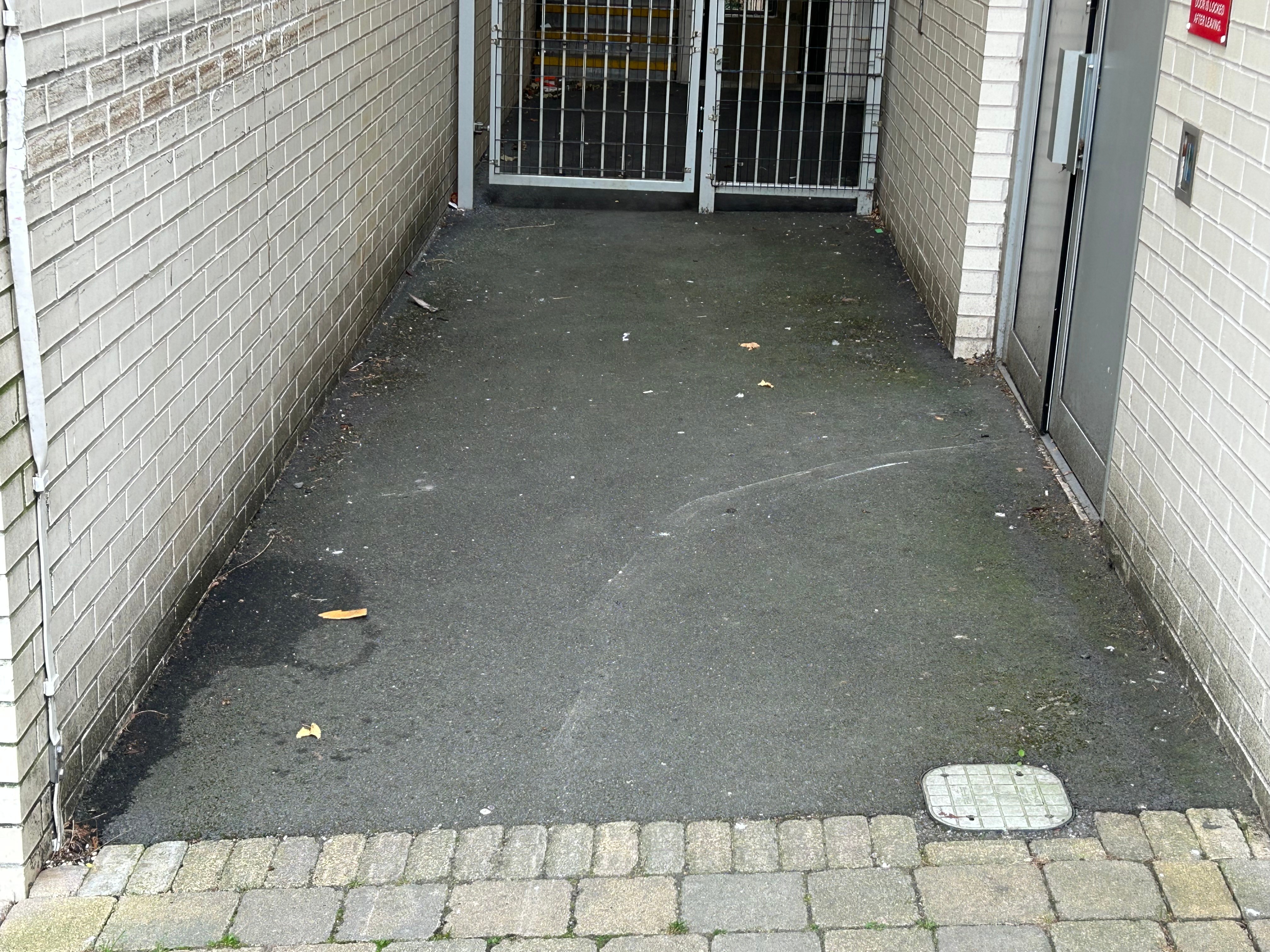 Communal area before cleaning - dirty walls and floor